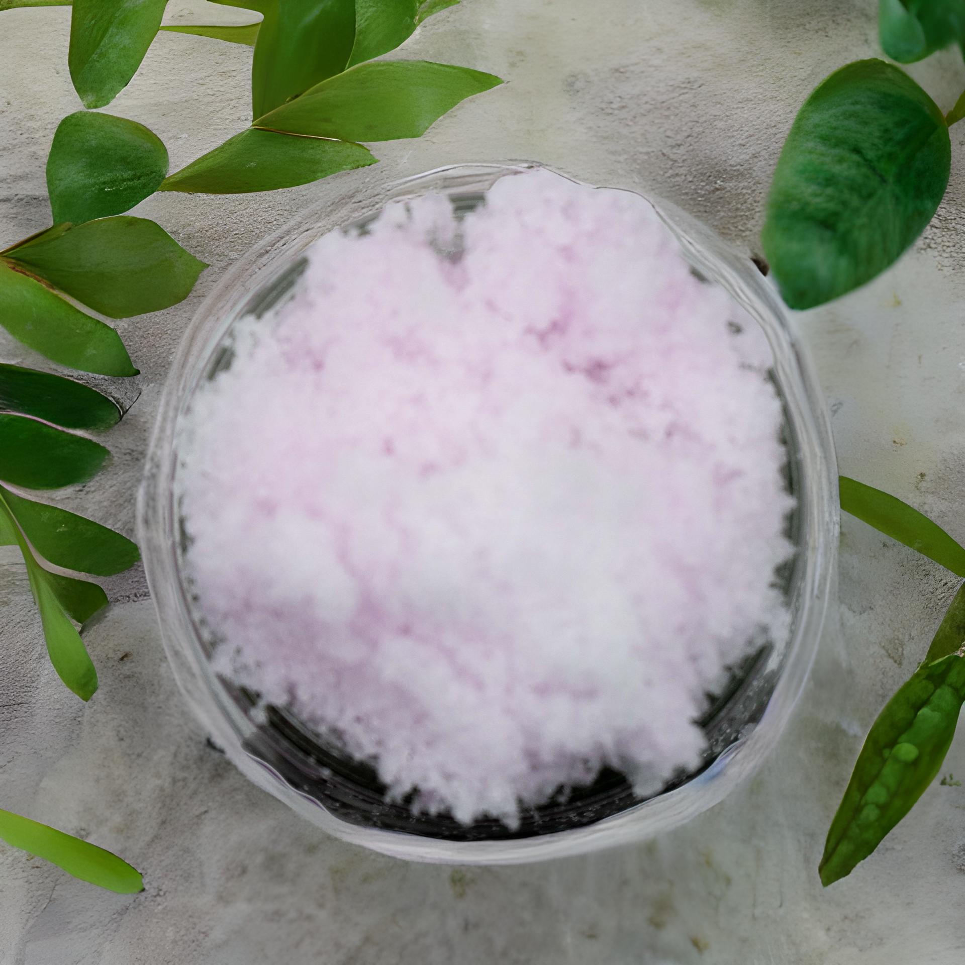 All-natural body scrub in glass jar"