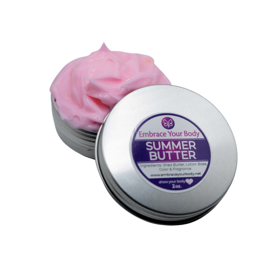 Pink lotion, in tin container with a circle label saying "embrace your body, summer butter"